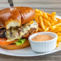 Dakar Burger · Seasoned 8oz Beef, Lettuce, Tomato, caramelized onions, cheddar cheese, and house-made sauce...