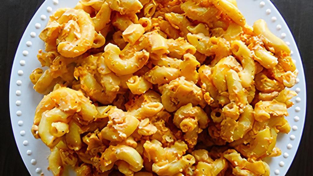 Mac N' Cheese · Baked with our flavorful homemade vegan cheese sauce. Contains soy.