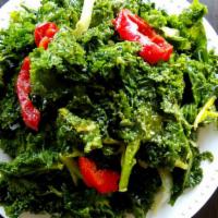 Sweet Kale Salad · Fresh kale lovingly massaged with agave, garlic, and peppers.