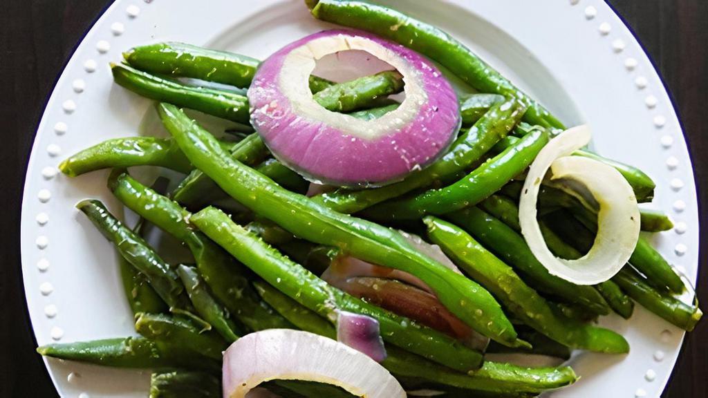 String Beans · Fresh string beans sauteed with red onions.