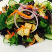 Jack’S Garden Salad · Mixed greens, cucumbers, tomatoes, onions, carrots, with croutons.