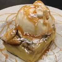 Bread Pudding · Brioche, custard, walnuts, with vanilla bean ice cream, topped with caramel sauce