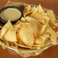 Chips & Queso · Fresh, Warm Tortilla Chips Seasoned With Our Southwest Seasoning And Served With Warm Queso ...