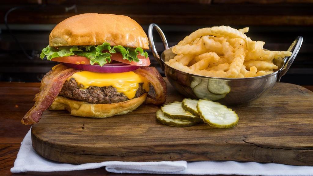 Bacon Cheese Burger · American Cheese And Bacon. Served With Crinkle Cut Fries and Pickles.