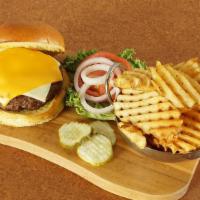 Three Cheese Burger · Smothered In American and Swiss Cheese. Served With Crinkle Cut Fries and Pickles.