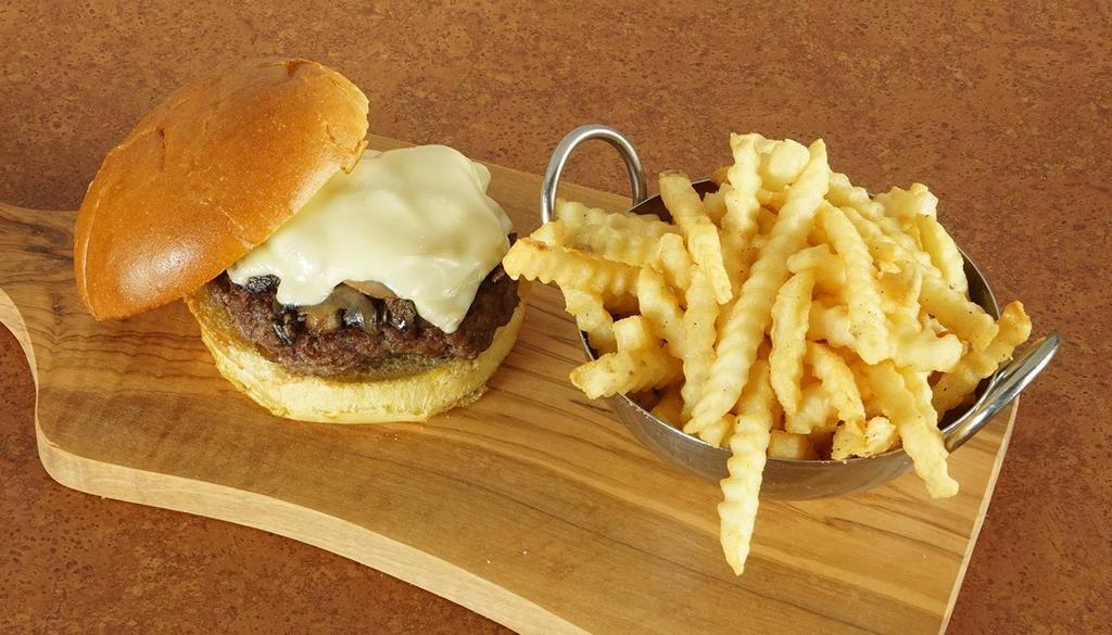 Old Fashioned Burger · Smothered In Sauteed Mushrooms And Swiss Cheese.