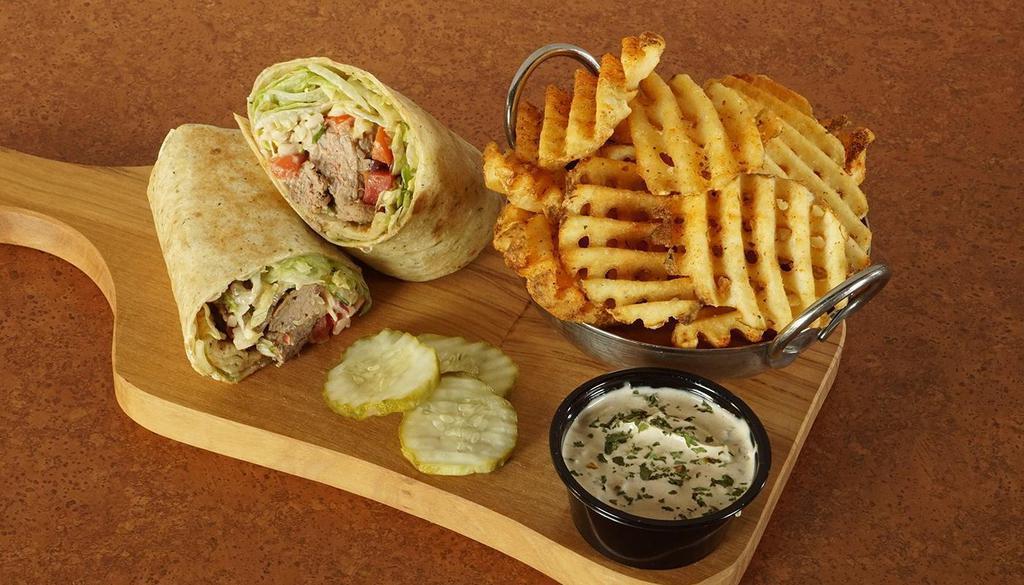 Steakhouse Wrap · Montreal Seasoned Sirloin Tips, Pico De Gallo, Shredded Lettuce, Southwest Ranch, Pepper Jack And Wrapped In A Herb Flour Tortilla.