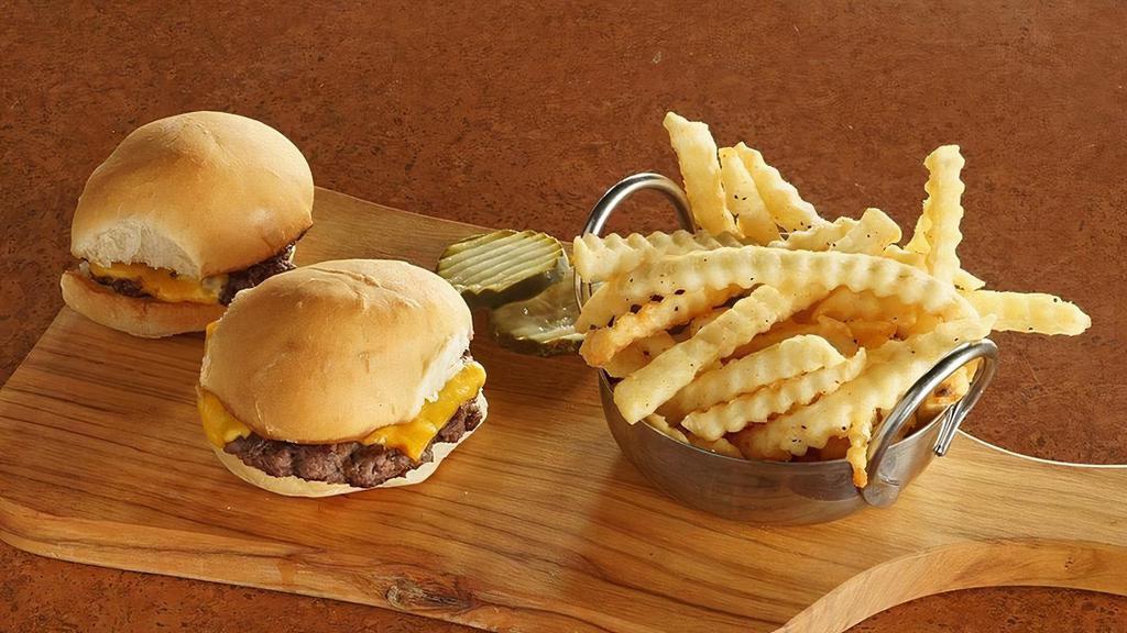 Kid Mini Cheeseburger · 2 mini burgers with American cheese. Ages 12 and under. Served with choice of strawberry apple sauce or french fries.