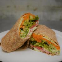 Veggie Monster Wrap · Our own red pepper hummus, your choice of cheese, sautéed veggie medley with rosemary, leaf ...