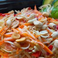 Som Tam Thai · Spicy green papaya salad with chili , tomato and crushed peanuts , mixed with lime juice , f...