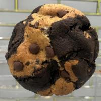 Brookie Cookie · This is a Fudge Brownie and Chocolate Chip cookie with White chocolate chips stuffed with Or...