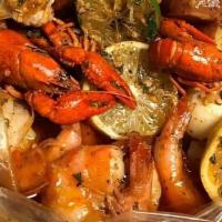 Seafood Platter (Large) · Snow crab, whole shrimp, crawfish, mussels, clams, corns and potatoes and sausage.
