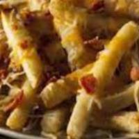 Grilled Cheese Fries · Melted American cheese, golden French fries, and crispy bacon between two slices of buttery ...