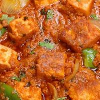 Paneer Tikka Masala  · Paneer marinated with authentic herbs , yogurt , spices , vegan dish ,
