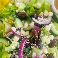 Greek Salad    · toss of romaine, red onion, Feta cheese, Kalama olives, cucumbers, pepperoncini and Italian ...