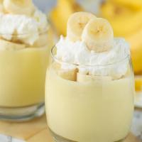 Banana Pudding · House-Made pudding with fresh bananas and Vanilla wafers topped with whipped cream
