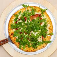 Fig & Goat Cheese Pizza · Fig preserves with prosciutto, mozzarella and goat cheese topped with arugula.