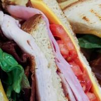 Harbor Club · Turkey, Ham, Bacon, Lettuce, Tomato, Mayo, American Cheese, White Bread