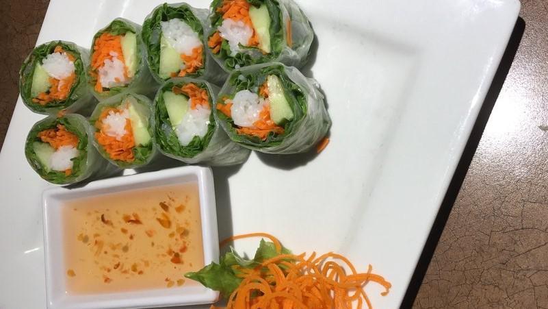 2 Piece Fresh Roll · Carrots, cilantro, cucumber, leaf lettuce and vermicelli rice noodles wrapped in fresh rice paper served with sweet chili sauce. Gluten-free.