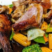 Sy Thai Duck · Roasted duck with broccoli, pea pods, baby corn, water chestnut, and carrots in a savory bro...