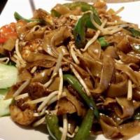 Drunken Noodle Dinner · Wok-tossed large rice noodles with wine, bean sprouts, bell pepper, green onion, and egg. Sp...