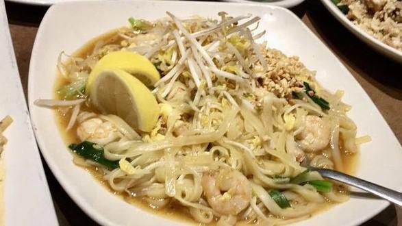 See Iew · Wok tossed large rice noodles with broccoli and egg in sweet soya sauce.