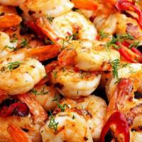 Shrimp Scampy · Shrimp cooked with fresh garlic and bacon in special cream sauce. Served with veggies or sal...