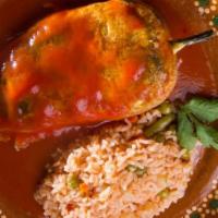 Chile Relleno · One poblano peppers, stuffed special cheese topped with guajillo sauce.