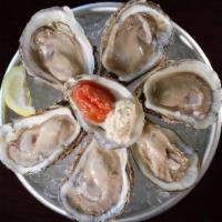 Fresh Raw Oysters · Fresh wild caught oysters from the Chesapeake Bay.