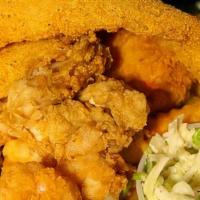 2 Fried Fish Fillets With 7 Fried Oysters With 2 Sides · 