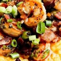 Garlic Shrimp & Cheddar Grits · Lemon garlic shrimp, bacon crumbles, chopped tomatoes, peppers and onions, with cheddar chee...