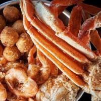 1Lb Crablegs & 1/2Lb Steamed Shrimp With One Side · Served with melted butter.