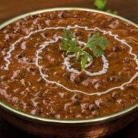 Dal Makhani · Lentils flavored with ground spices and sautéed in butter. Served with rice.