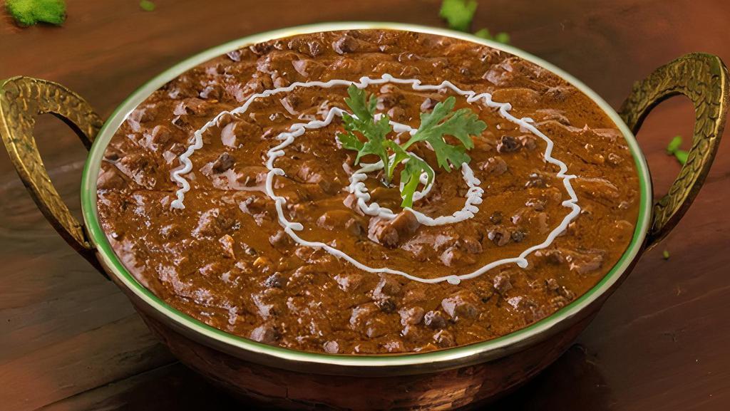 Dal Makhani · Lentils flavored with ground spices and sautéed in butter. Served with rice.