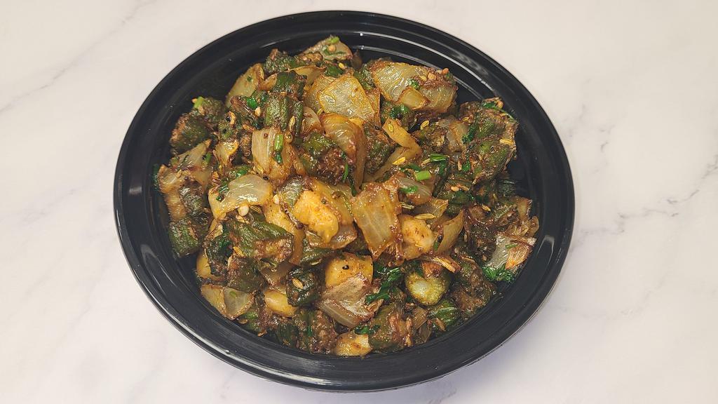 Bhindi Masala · Fresh Okra cooked with tomatoes, onions, herbs and spices. Served with rice.