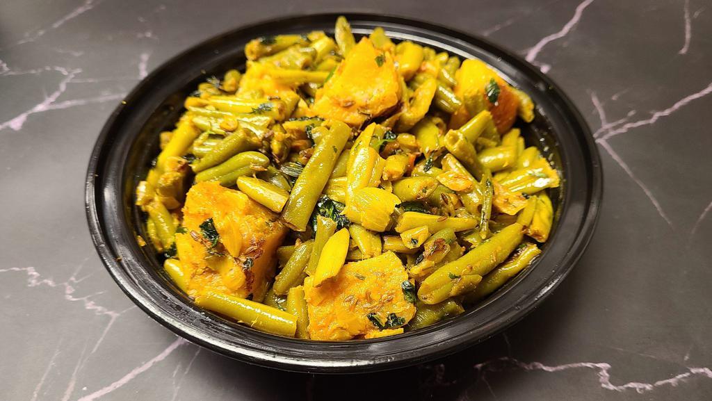 Aloo Beans · String beans and potatoes sautéed in spices. Served with rice.