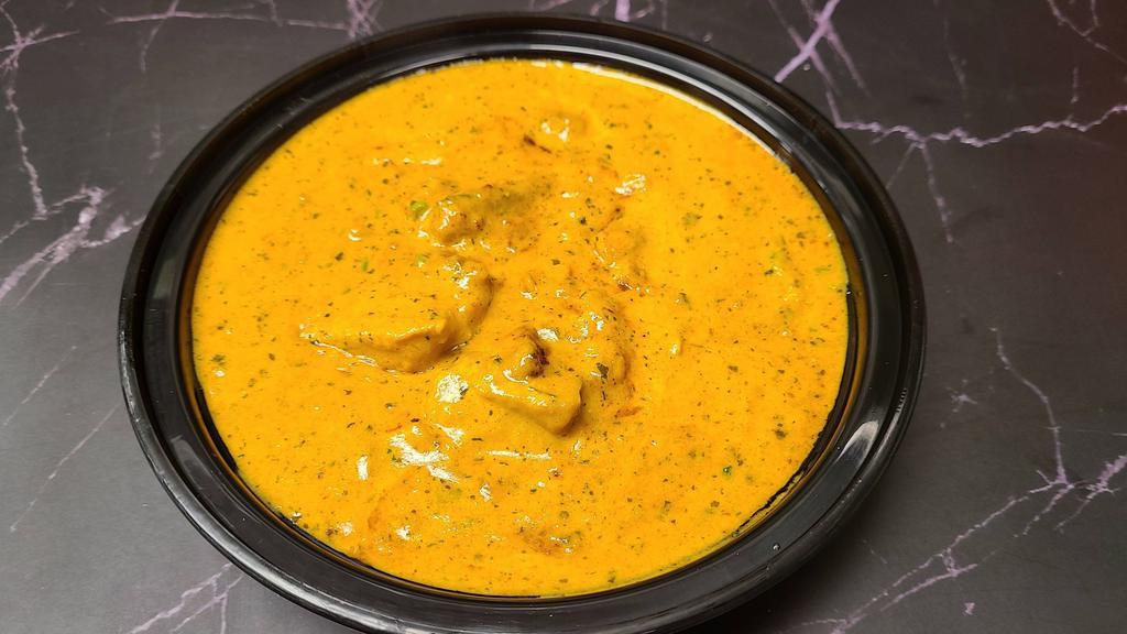 Chicken Korma · Chicken made with mild nutty creamy sauce. served with rice.