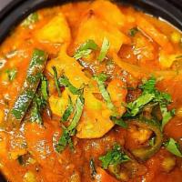 Vegetable Jalfrezi · Vegetables in a curry with garden fresh vegetables. Served with rice.