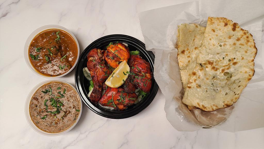 Special Akbar Dinner · Non vegetarian platter includes, choice of mulligatawny soup or vegetable samosa, tandoori chicken, boti kebab, chicken tikka, rogan josh, dal, and onion kulcha.