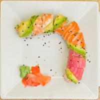 Rainbow Roll · Raw. California roll topped with salmon, tuna, and ebi shrimp.