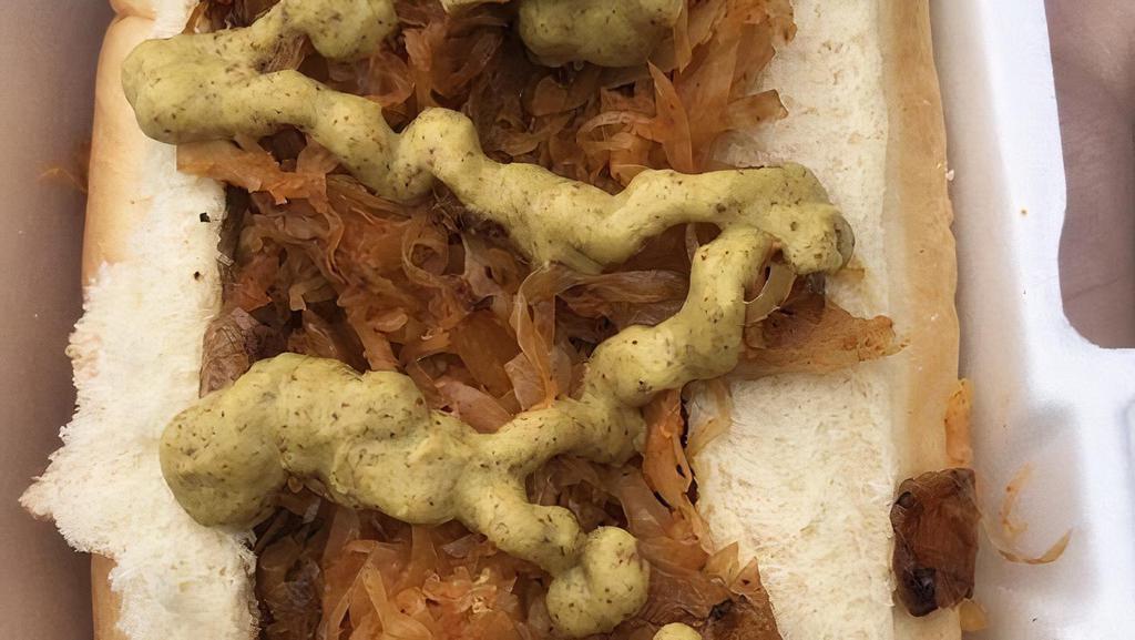 New York Dog · Topped with sauerkraut, sautéed onions & spicy brown mustard