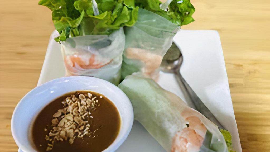 Shrimp Salad Rolls · vermicelli noodles, carrots, bean sprouts, lettuce and basil wrapped in rice paper, served with homemade peanut sauce. Shrimp