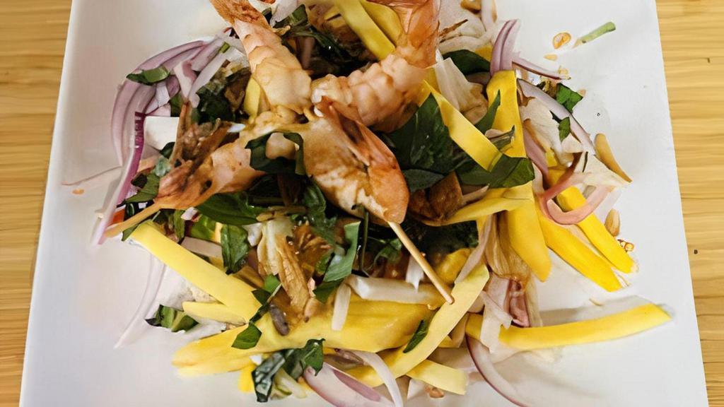 Sweet Mango Salad · ripe mango slices with grilled shrimp, jicama, red onion and basil tossed in tangy lime vinaigrette topped with fried shallots