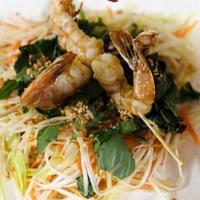Green Papaya Salad · shredded green papaya with shrimp, carrots and Vietnamese coriander,
tossed in tangy lime vi...