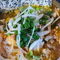 Da Nang Tumeric Noodle · seasoned turmeric broth ladled over wide rice noodles, minced pork, shrimp and diced jicama ...