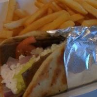 Lamb Gyro · Served with lettuce tomatoes onions cucumber sauce and feta cheese on pita bread.