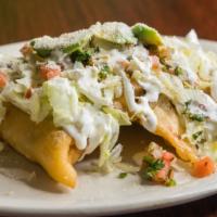 Quesadillas Fritas (3) · Bistec, pastor, chicken fajita, campechanas or cheese. Served with lettuce, pico de gallo, a...