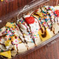 Banana Split · Three scoops of ice cream, one banana, whipped cream, strawberries, pineapple, chocolate syr...