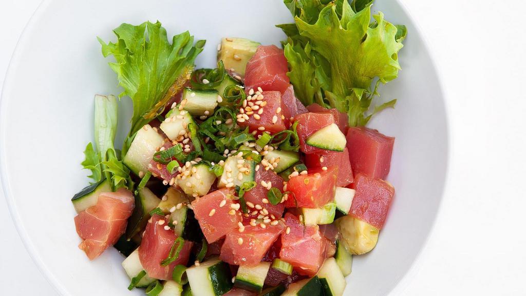 Tuna Poke · Tuna, avocado, scallions, cucumber, sesame seeds, sesame oil, rice