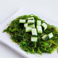 Seaweed Salad. · Wakame seaweed, sesame seeds, chopped cucumber